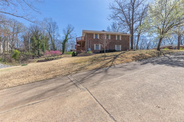 view of front of home with brick siding