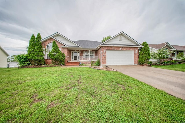 single story home with a garage, a porch, driveway, and brick siding
