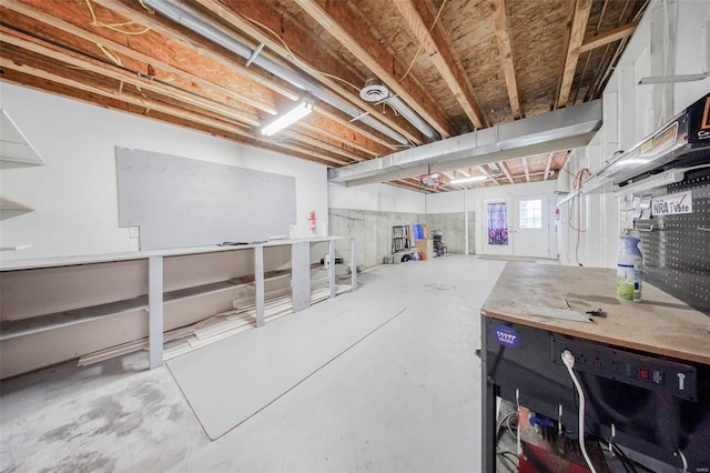 basement featuring a workshop area