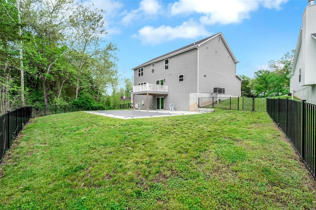 view of yard with a fenced backyard and a patio