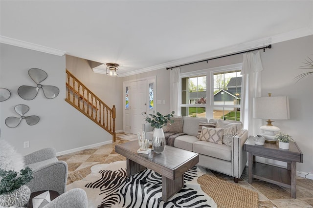 living room with crown molding, baseboards, and stairs