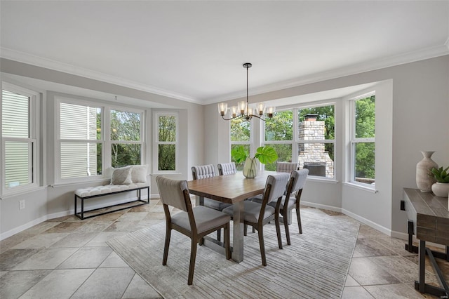 dining area featuring baseboards, an inviting chandelier, and ornamental molding