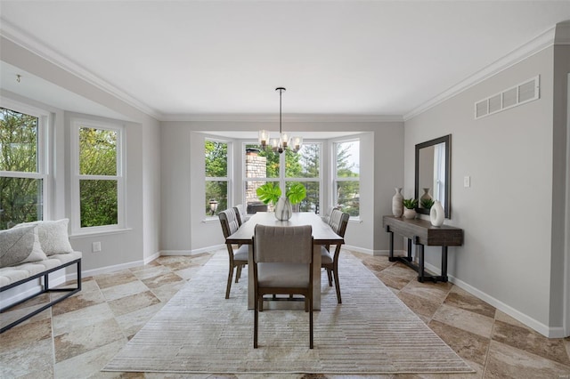 dining room with crown molding, a chandelier, baseboards, visible vents, and stone tile flooring