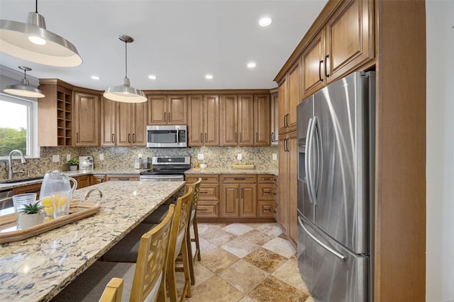 kitchen featuring open shelves, brown cabinetry, stainless steel appliances, tasteful backsplash, and pendant lighting
