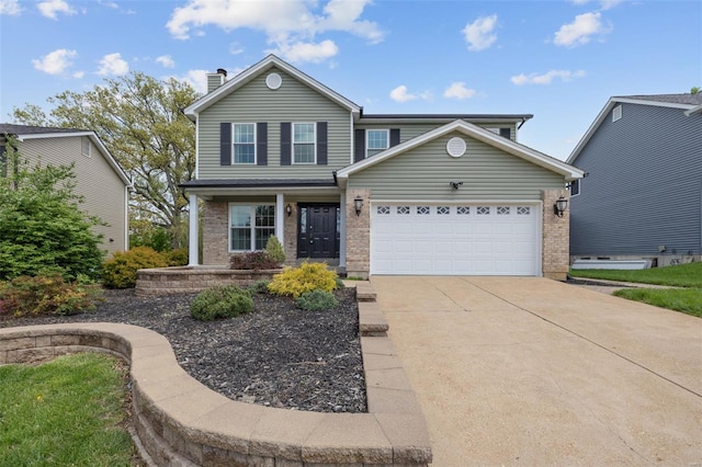 view of front of house with an attached garage, a chimney, driveway, and brick siding