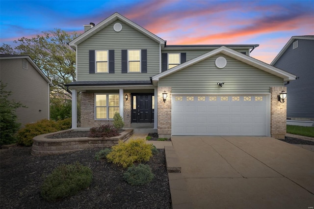 traditional home with brick siding, a garage, a chimney, covered porch, and driveway