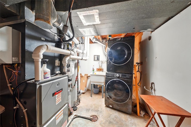 utilities featuring stacked washer / drying machine