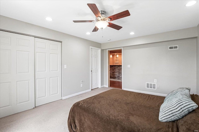 bedroom featuring carpet flooring, baseboards, visible vents, and recessed lighting