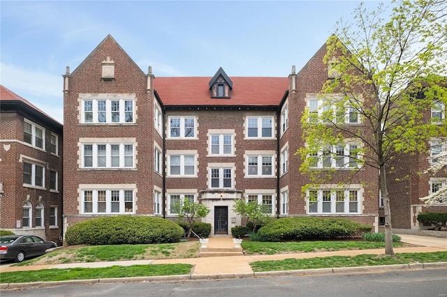view of front of home featuring brick siding