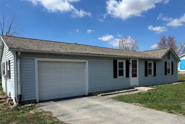 single story home featuring driveway, a shingled roof, and a garage