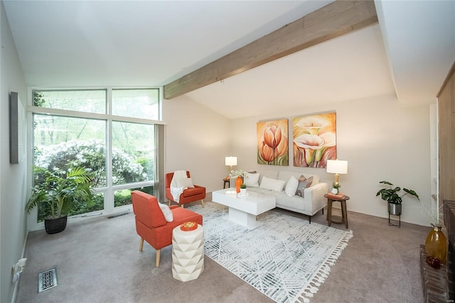 living area with carpet floors, visible vents, and vaulted ceiling with beams