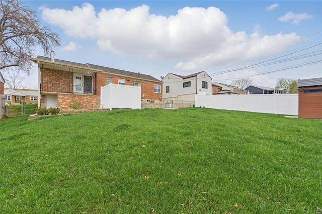 view of yard with fence