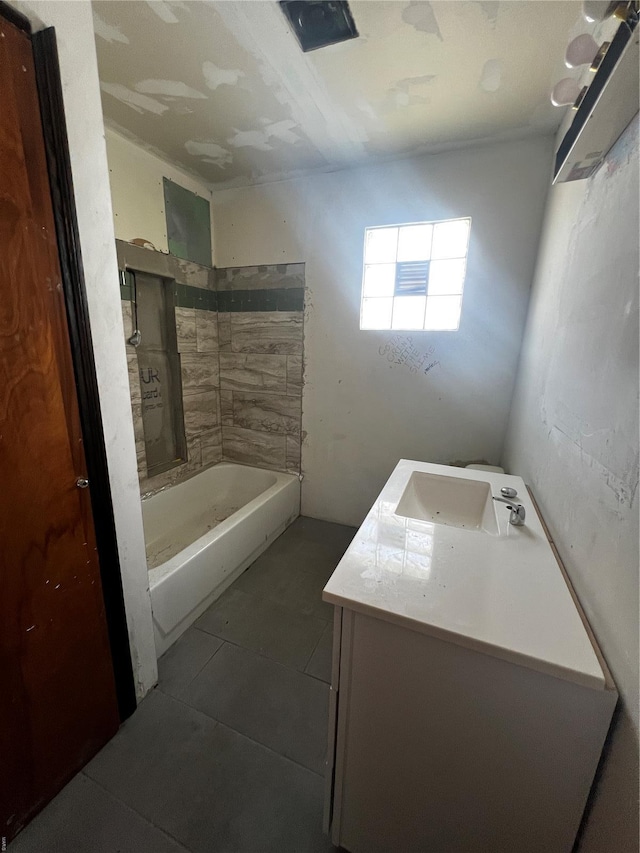 bathroom featuring shower / bath combination, tile patterned flooring, and vanity