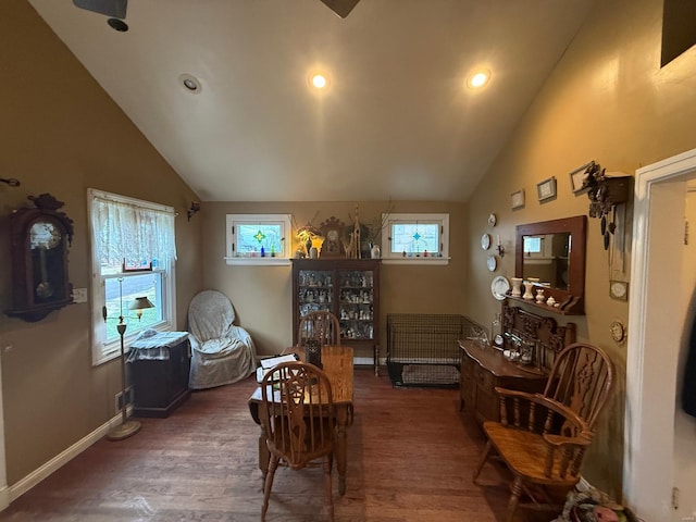interior space with recessed lighting, baseboards, lofted ceiling, and wood finished floors