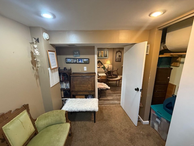 living area with carpet floors
