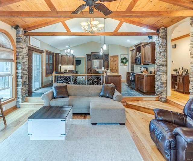 living room featuring wooden ceiling, wood finished floors, vaulted ceiling with beams, and ceiling fan with notable chandelier