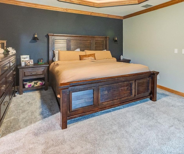 carpeted bedroom featuring ornamental molding, visible vents, and baseboards