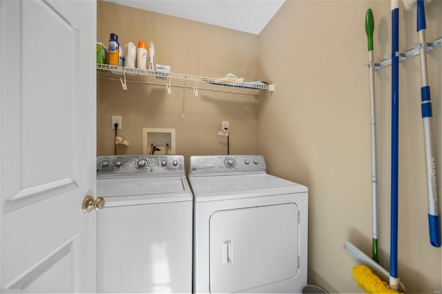 laundry area with laundry area and washer and dryer