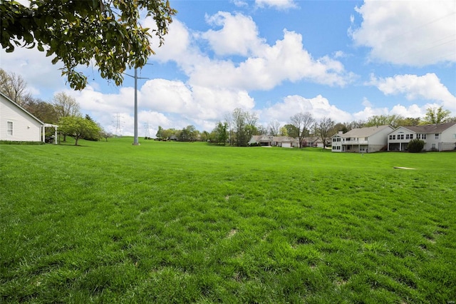 view of yard featuring a residential view