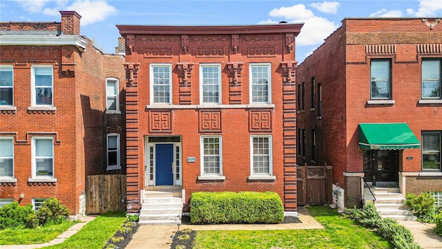 view of front of property with brick siding