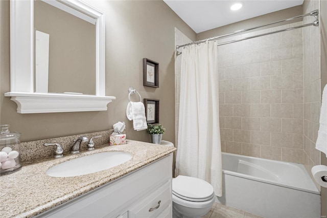 bathroom featuring tile patterned floors, shower / bathtub combination with curtain, toilet, and vanity