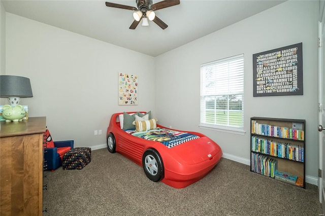 bedroom with baseboards, a ceiling fan, and carpet floors