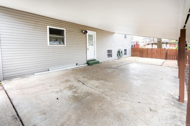 view of patio / terrace featuring fence