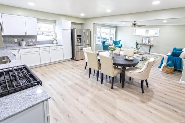 dining room featuring recessed lighting, light wood-style flooring, baseboards, and ceiling fan