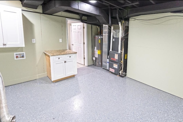 unfinished basement featuring water heater and heating unit