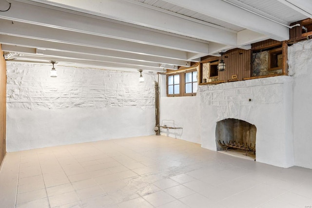 below grade area with a fireplace