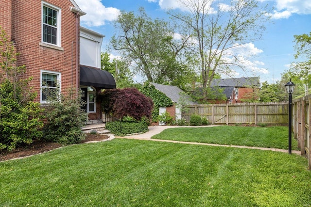 view of yard featuring fence