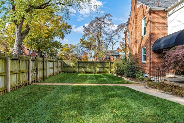 view of yard featuring a fenced backyard
