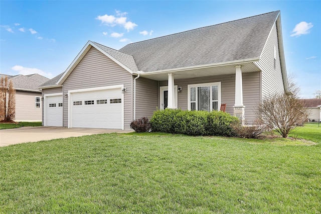 view of front of home featuring driveway, an attached garage, a front lawn, and roof with shingles