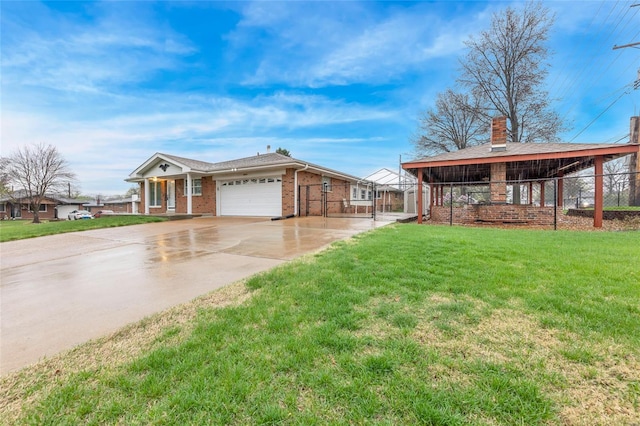 view of front of house with a front lawn, brick siding, an attached garage, a chimney, and concrete driveway