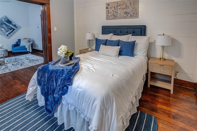 bedroom with wood finished floors
