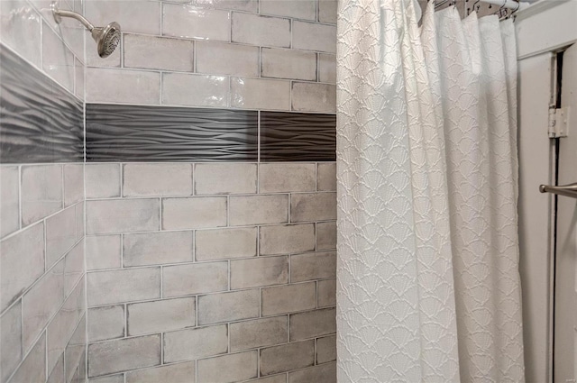 details with a tile shower