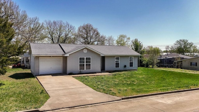 single story home featuring driveway, a garage, and a front lawn
