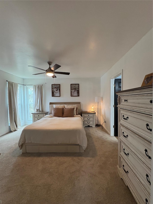 bedroom with carpet flooring and a ceiling fan