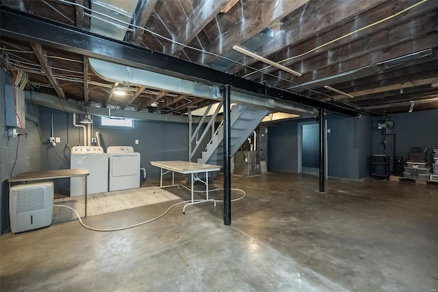below grade area with independent washer and dryer and stairs
