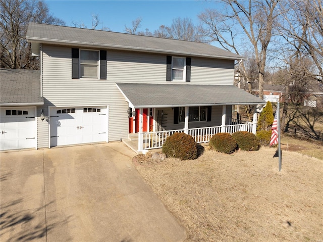 view of front of house with an attached garage, concrete driveway, and a porch