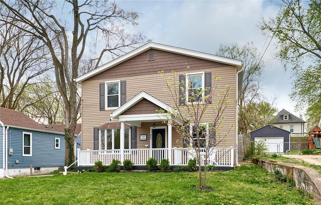 traditional-style home featuring an outdoor structure, a front lawn, a porch, a garage, and fence