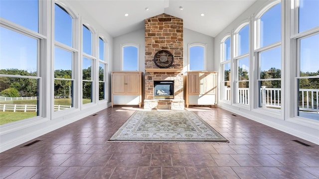 unfurnished sunroom with a wealth of natural light and visible vents