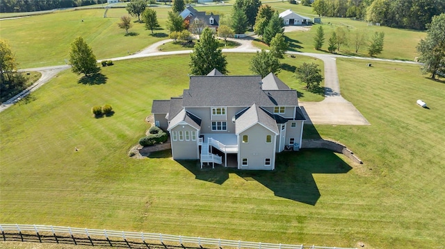 birds eye view of property featuring a rural view