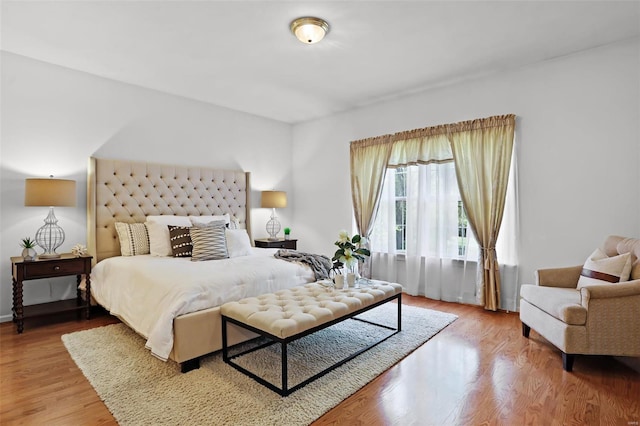 bedroom featuring wood finished floors