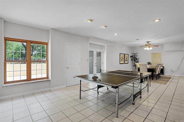 rec room with baseboards, recessed lighting, light tile patterned floors, and a ceiling fan