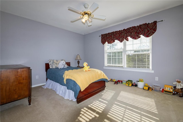 carpeted bedroom featuring a ceiling fan