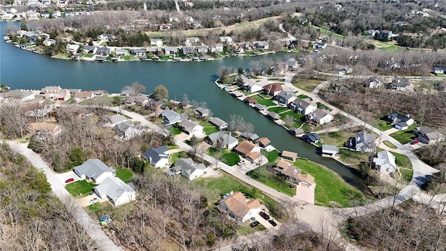 bird's eye view with a residential view and a water view