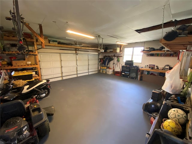 garage featuring a workshop area