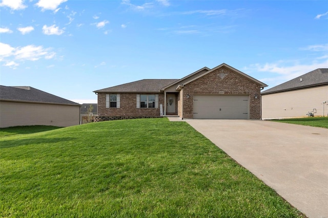 ranch-style home featuring brick siding, a front lawn, a garage, and concrete driveway