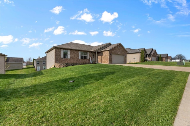 ranch-style home with an attached garage, concrete driveway, a front yard, and brick siding